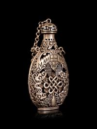 A Chinese Reticulated Silver Snuff Bottle