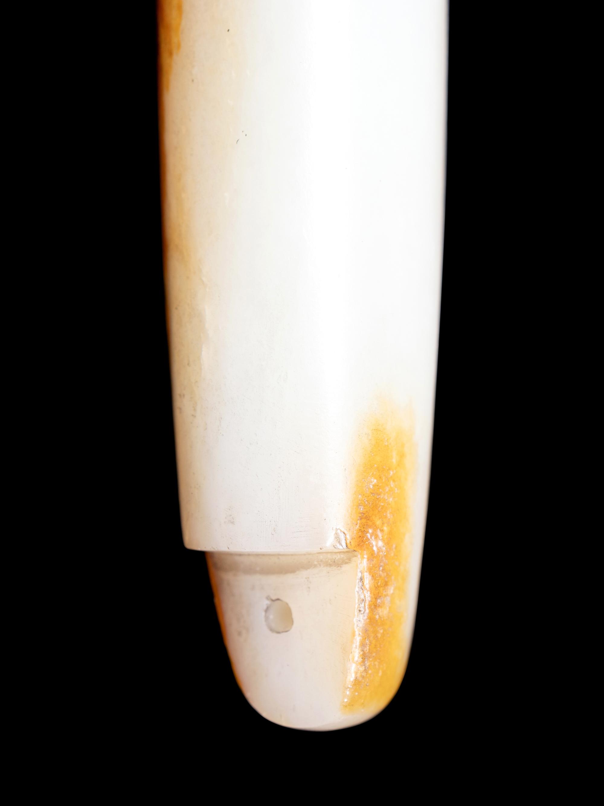 Two Chinese Celadon and Russet Jade Articles