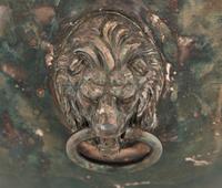 An Assembled Trio of Silverplate Footed Punch Bowls with Lionhead Handles