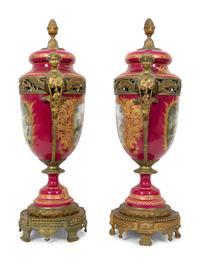 A Pair of Gilt Bronze Mounted Sevres Style Porcelain Covered Urns