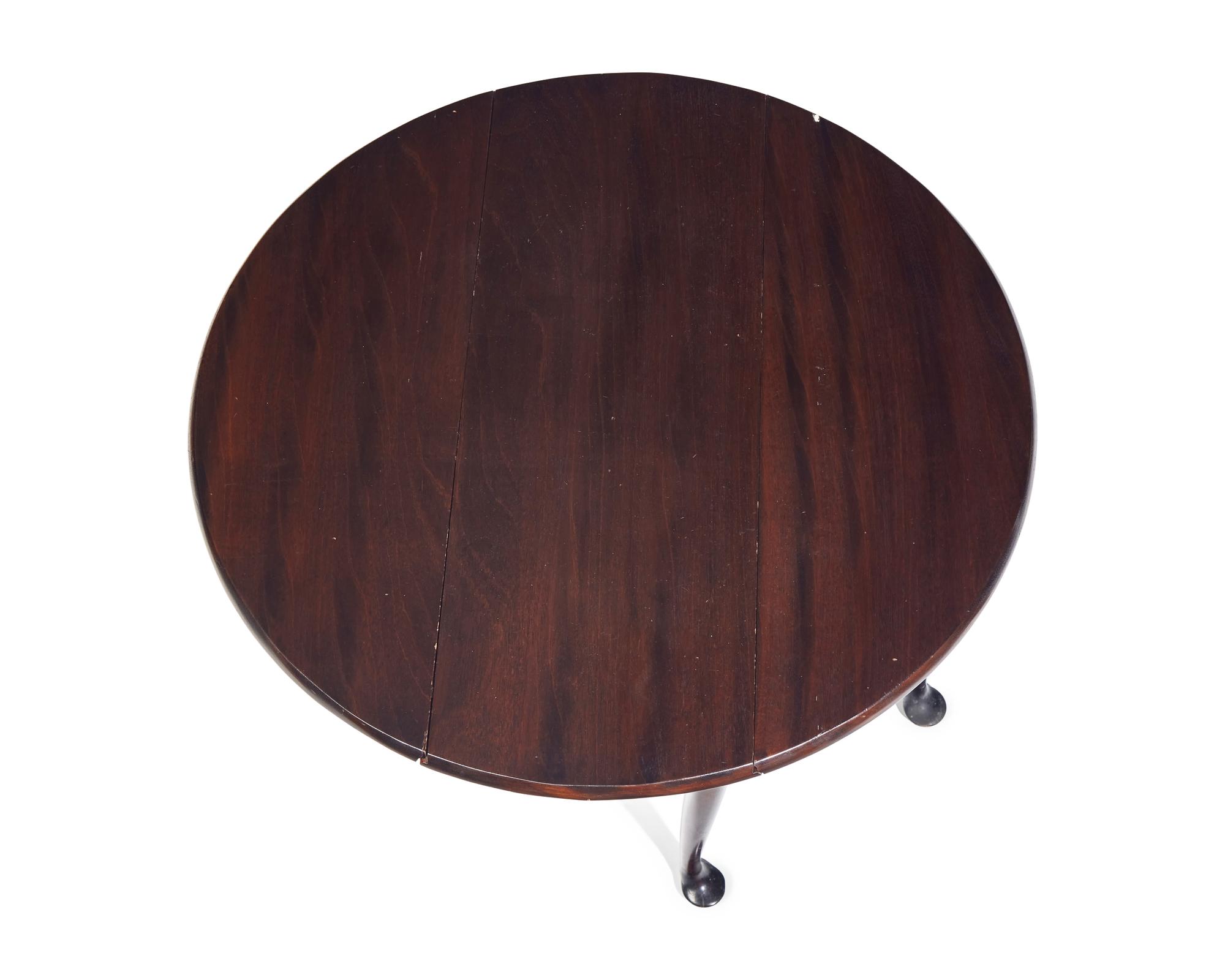 A Queen Anne Mahogany Drop-Leaf Table