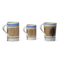 A Group of Three Large Mochaware Mugs with "Seaweed Decoration"