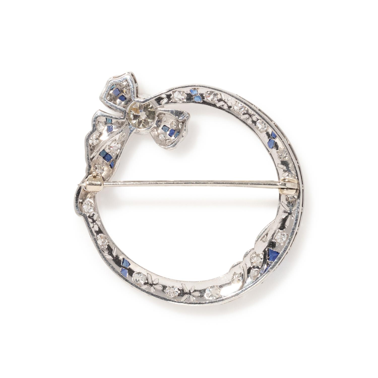 ART DECO, DIAMOND AND SAPPHIRE CIRCLE BROOCH