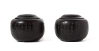A Pair of Zitan Wood Carved Boxes Height of each 3 3/4 inches.
