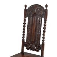 A Matched Pair of Charles II Carved Oak Side Chairs
