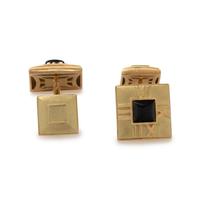 TIFFANY & CO., YELLOW GOLD AND ONYX 'ATLAS' CUFFLINKS