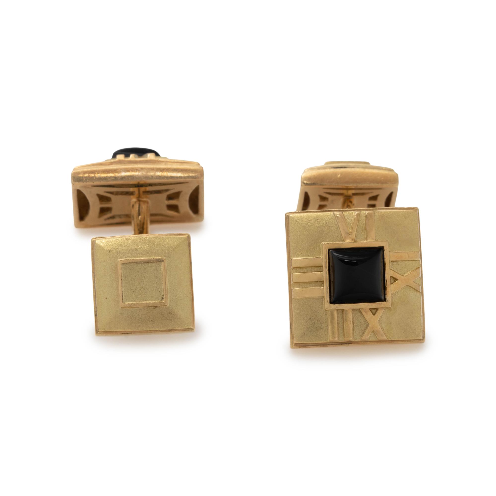 TIFFANY & CO., YELLOW GOLD AND ONYX 'ATLAS' CUFFLINKS