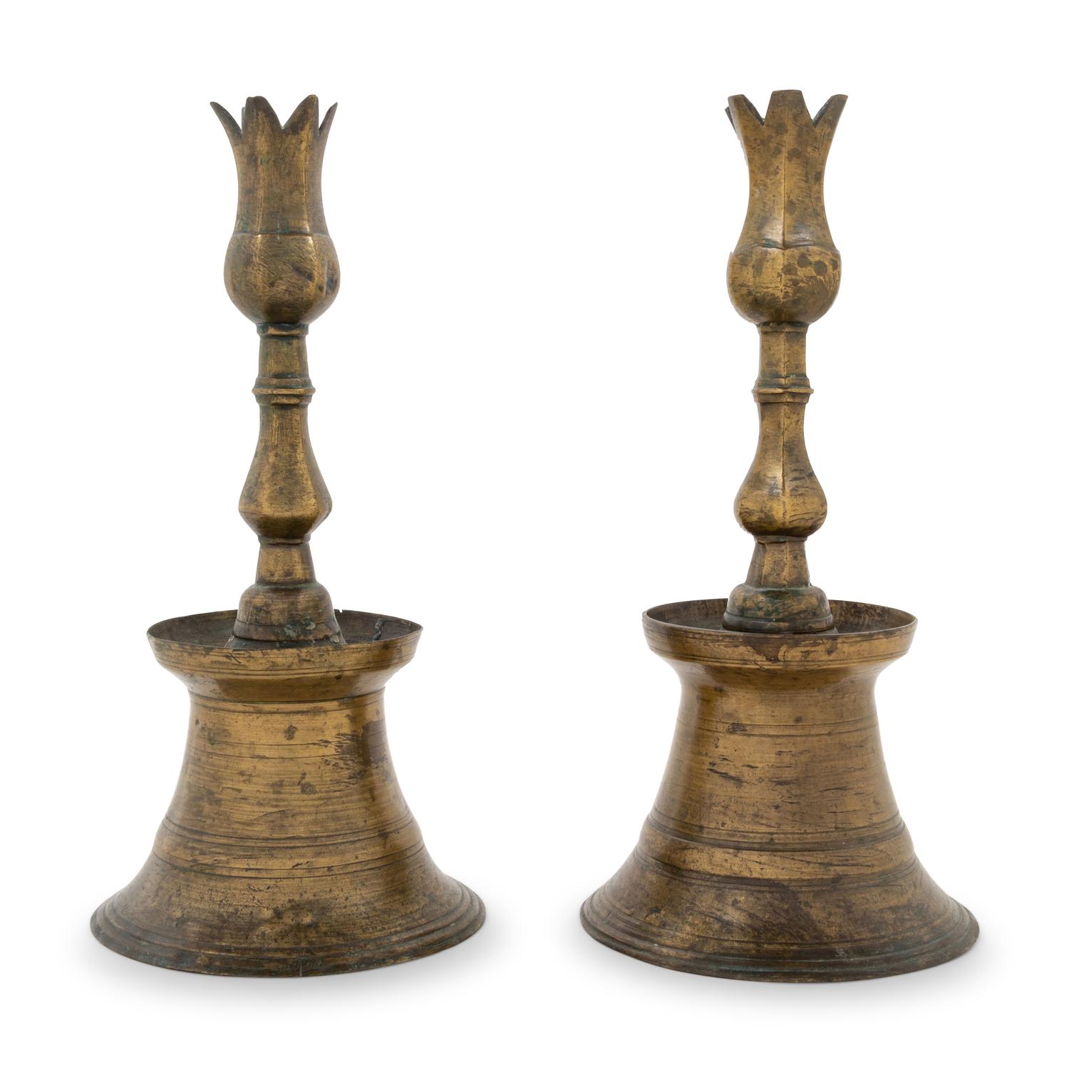 A Pair of Ottoman Cast Brass Candlesticks