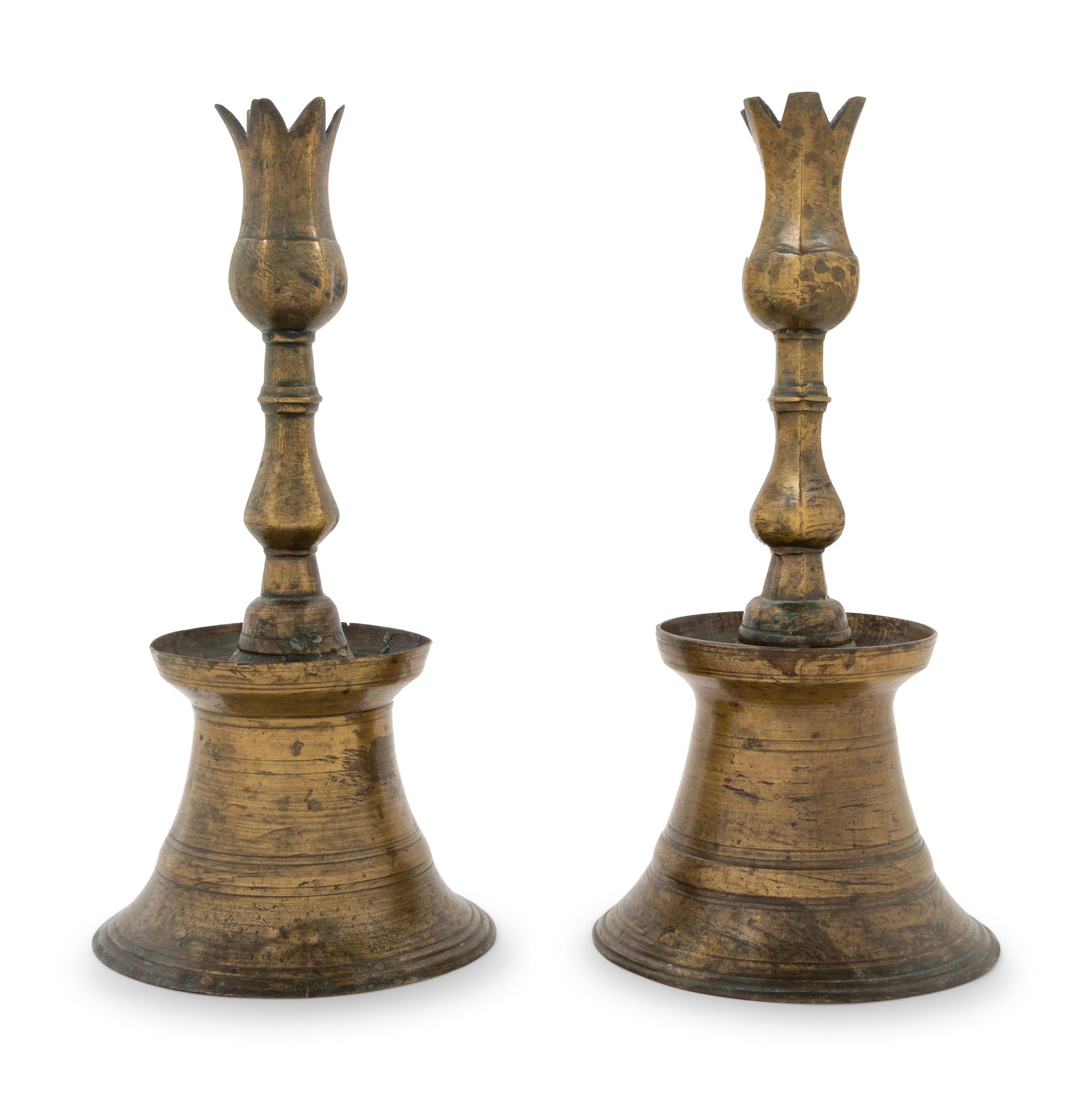 A Pair of Ottoman Cast Brass Candlesticks