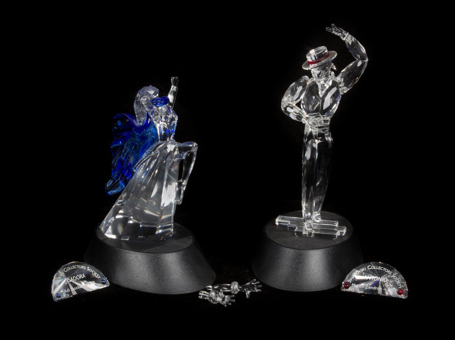 Two Swarovski Cut Glass Figures Height of first 8 3/8 inches.