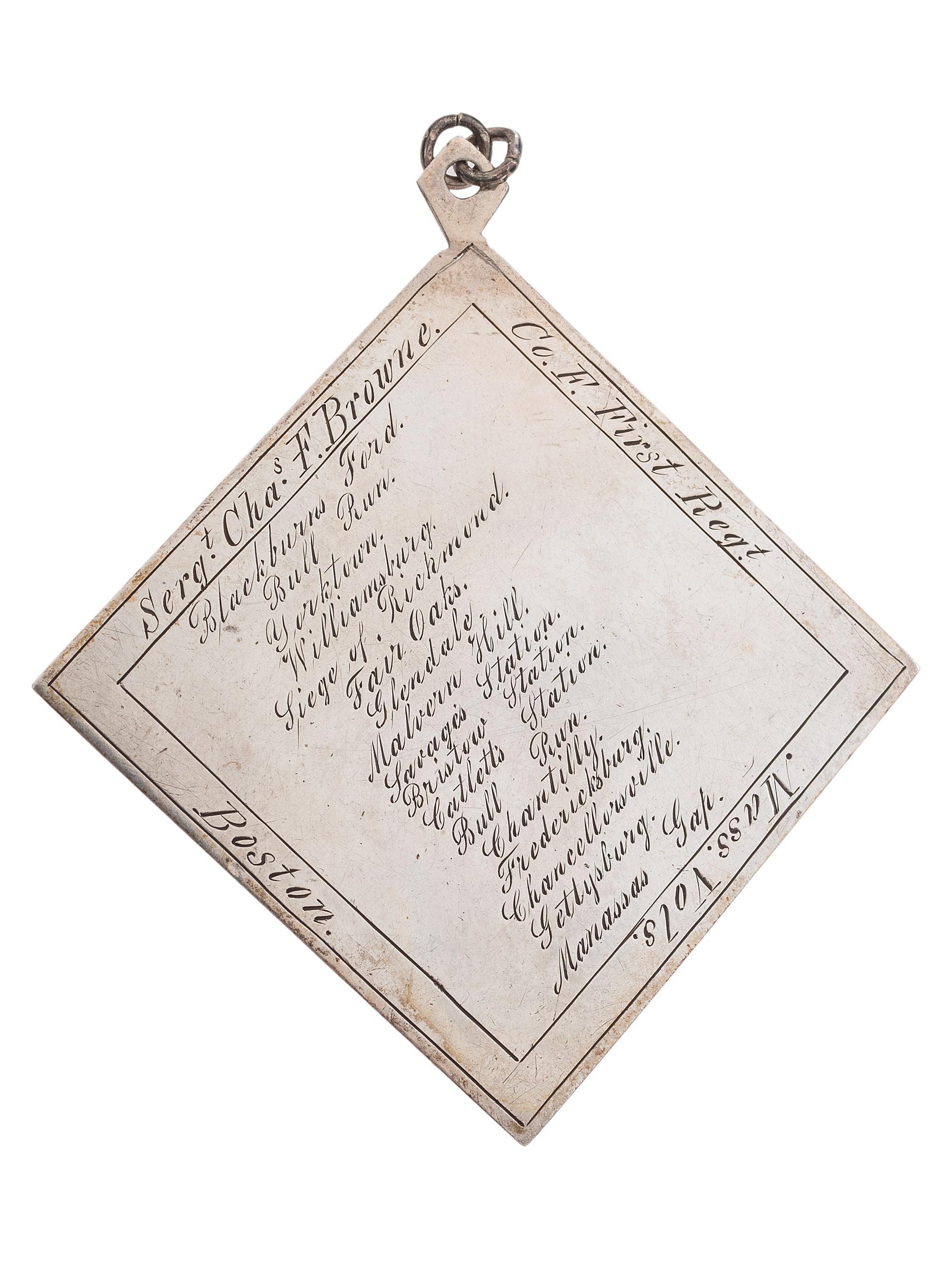 [CIVIL WAR]. III Corps badge identified to Sergeant Charles F. Browne, Company F, 1st Massachusetts Regiment, WIA Fredericksburg, Chancellorsville, and Gettysburg.
