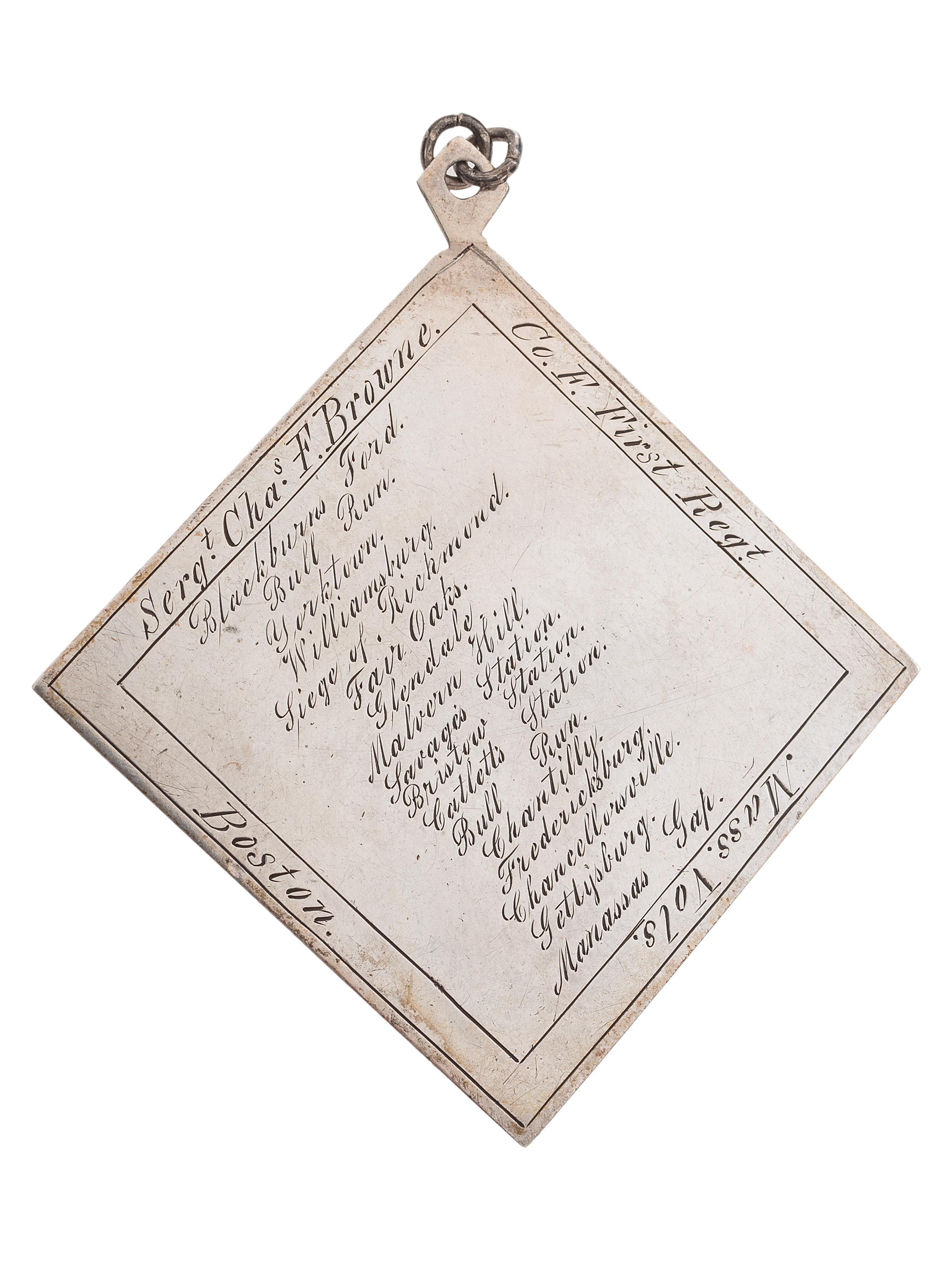 [CIVIL WAR]. III Corps badge identified to Sergeant Charles F. Browne, Company F, 1st Massachusetts Regiment, WIA Fredericksburg, Chancellorsville, and Gettysburg.
