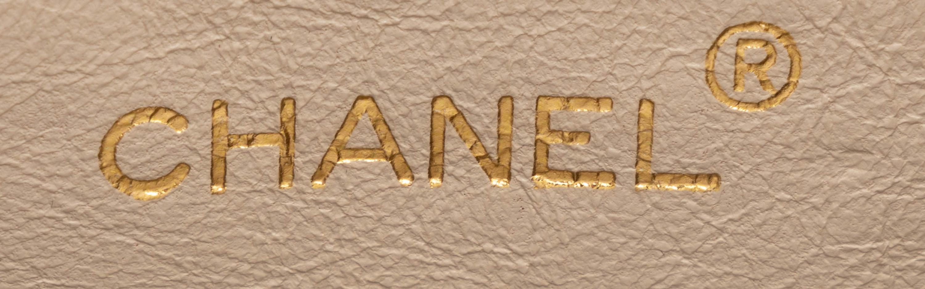 Chanel, Kisslock Bag in Quilted Pink Suede