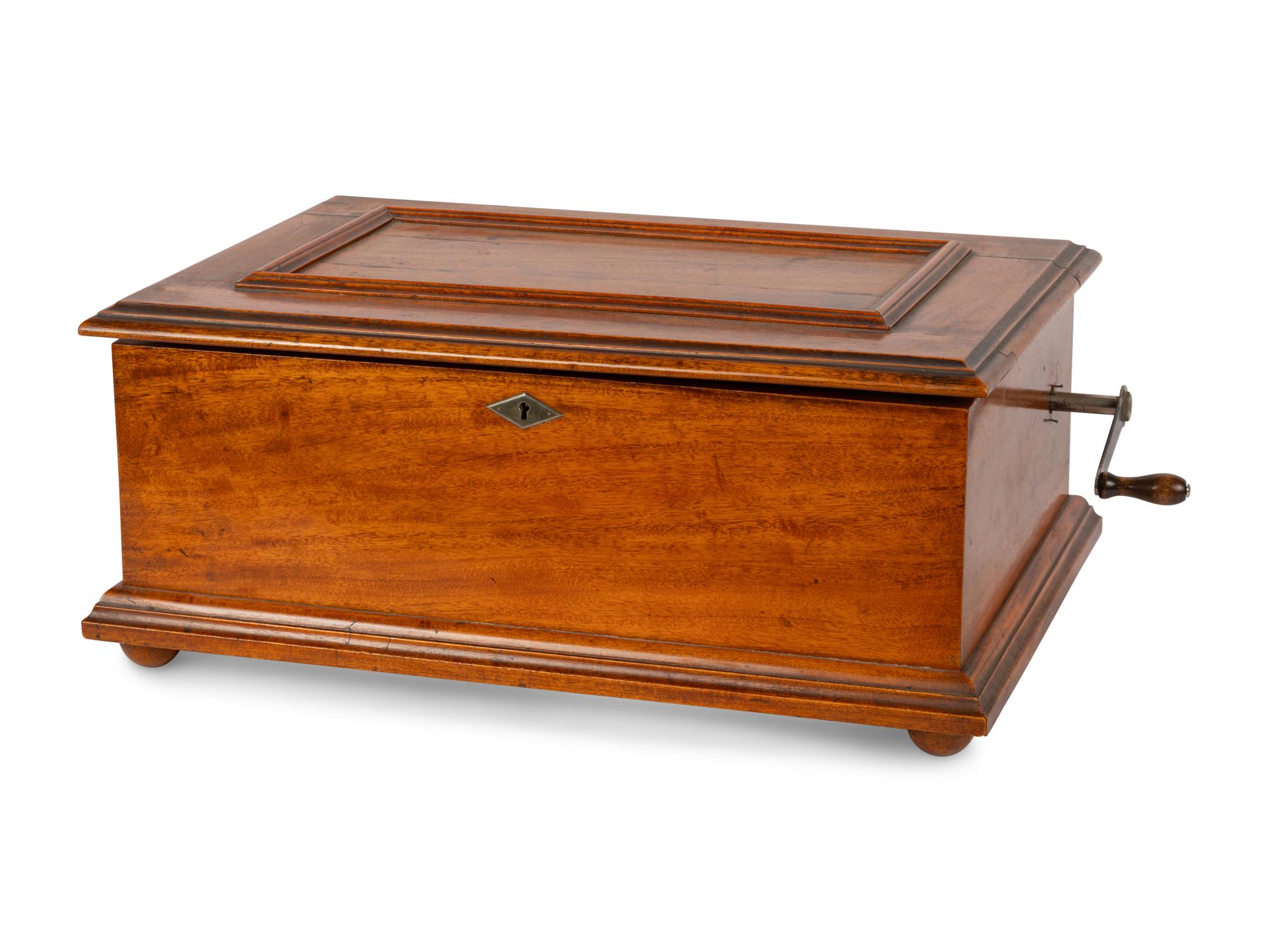 A Capital Cuff Model C Music Box