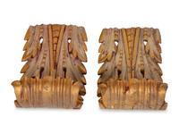A Pair of Continental Painted and Giltwood Brackets