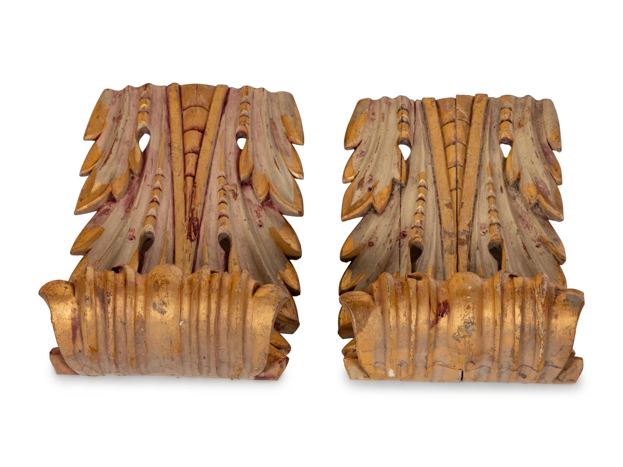A Pair of Continental Painted and Giltwood Brackets