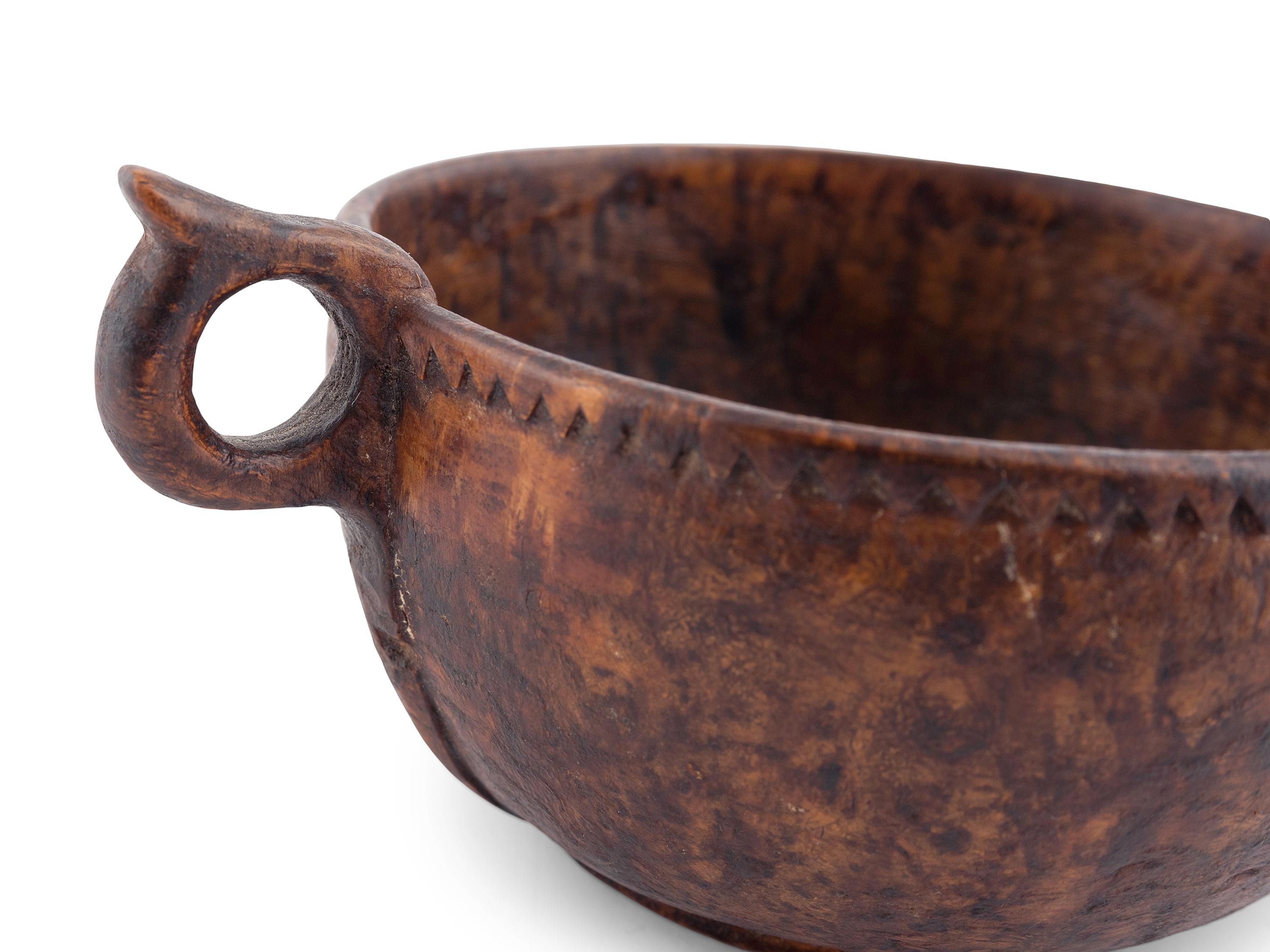 A Finely Turned and Carved Burlwood Cup with Handle