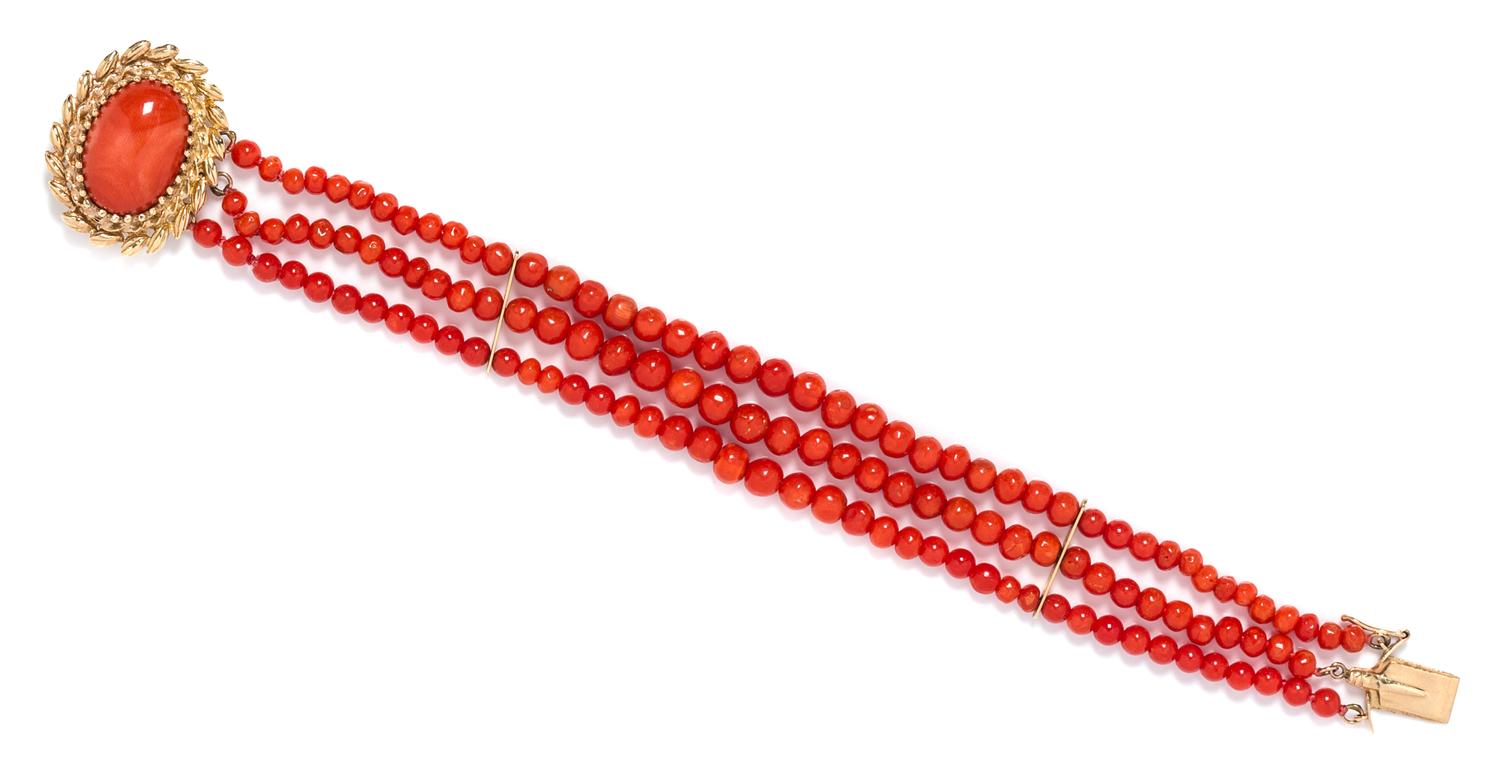 A Yellow Gold and Graduated Multistrand Coral Bead Bracelet, 14.00 dwts.