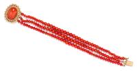 A Yellow Gold and Graduated Multistrand Coral Bead Bracelet, 14.00 dwts.