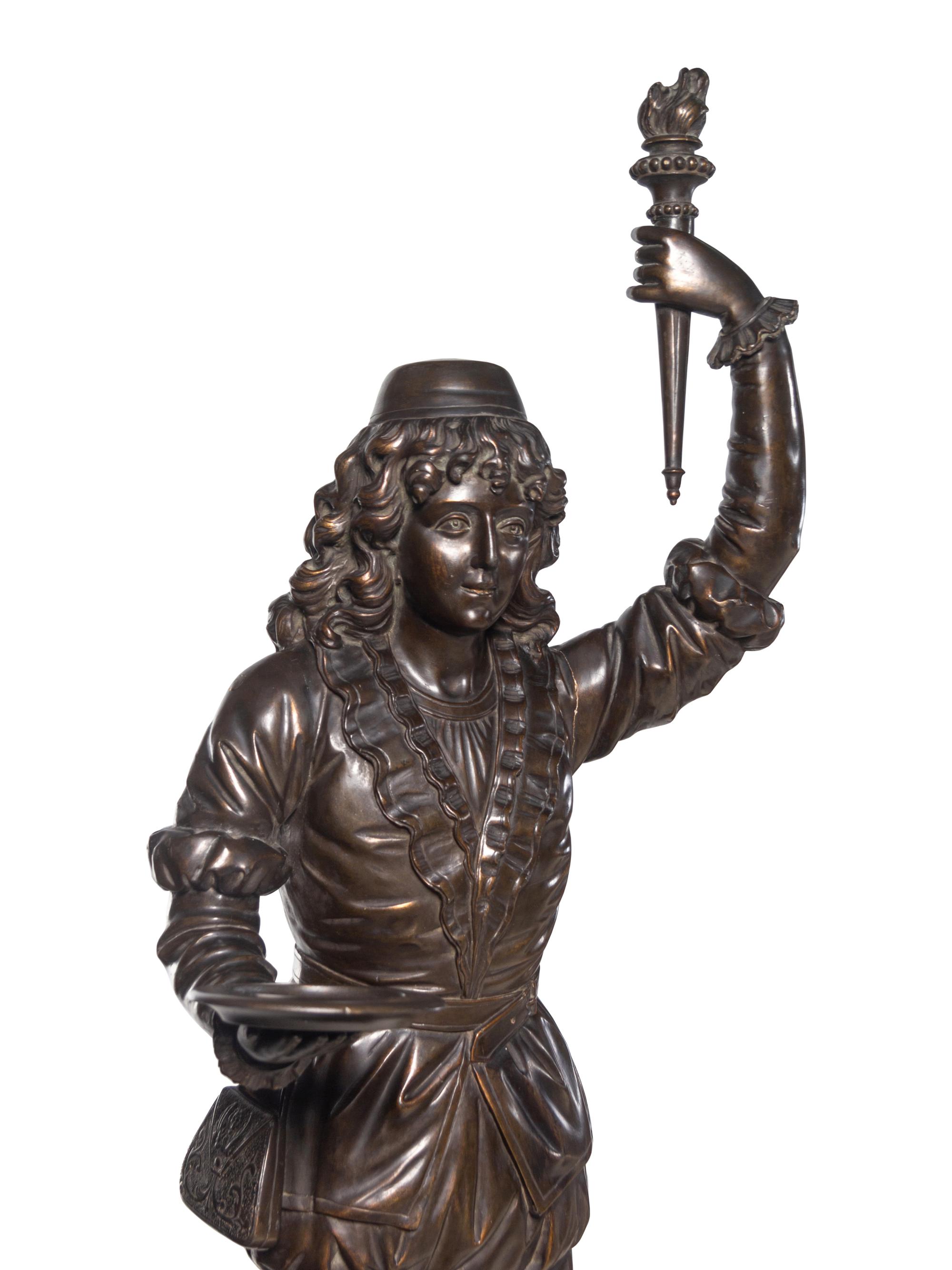 An Italian Carved and Stained Figure of a Page Boy in the Manner of Valentino Besarel