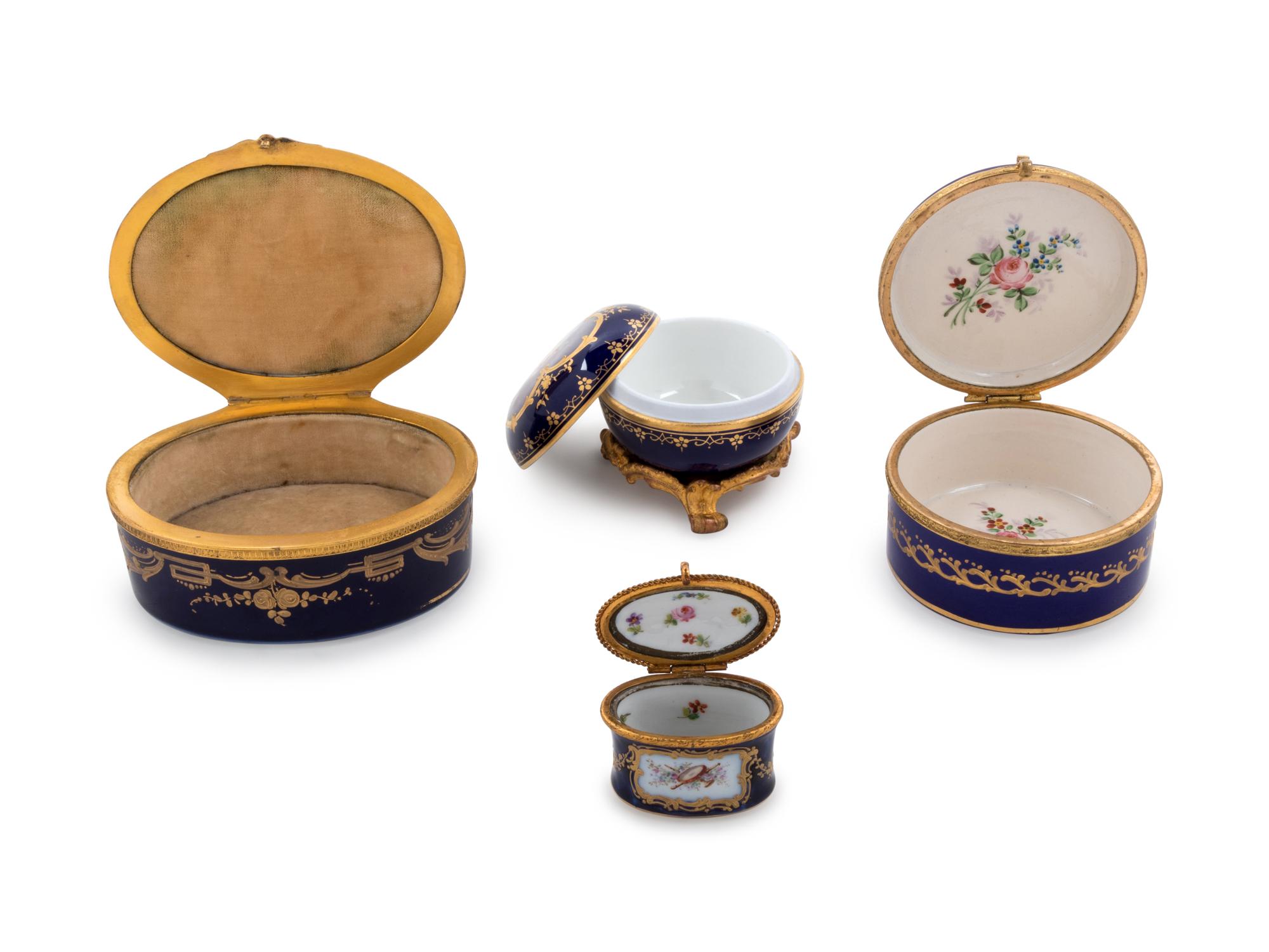 Four Sèvres Style Painted and Parcel Gilt Porcelain Boxes