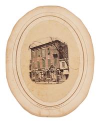 [EARLY PHOTOGRAPHY] Albumen photograph of "Ambrotypes & Photographs" studio, possibly in New Jersey.