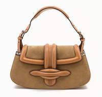 A Christian Dior Tan Suede and Leather Bag, 11 x 4 1/2 x 3 inches.
