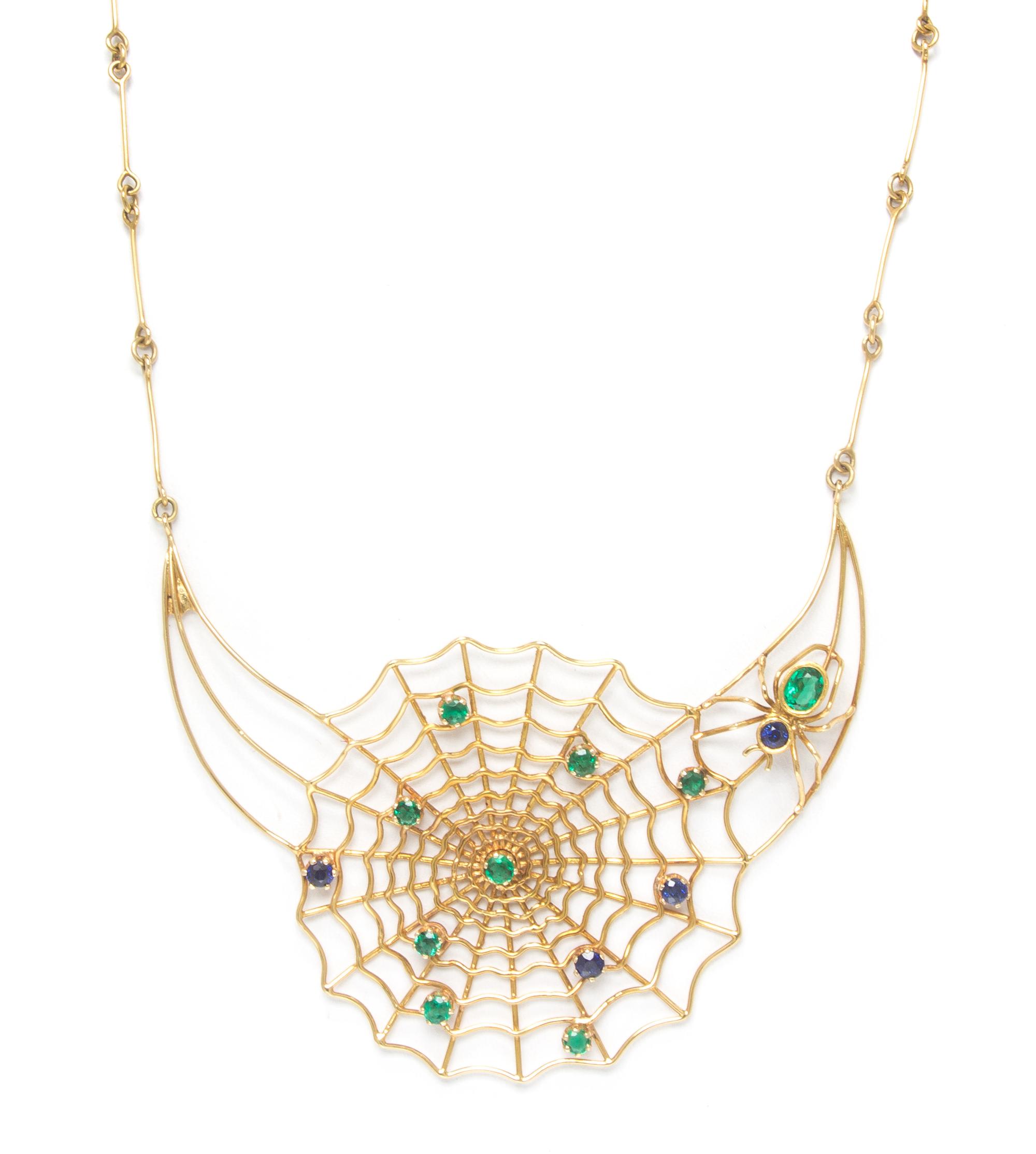 An 18 Karat Yellow Gold, Emerald and Sapphire Spider Web Necklace, 14.10 dwts.