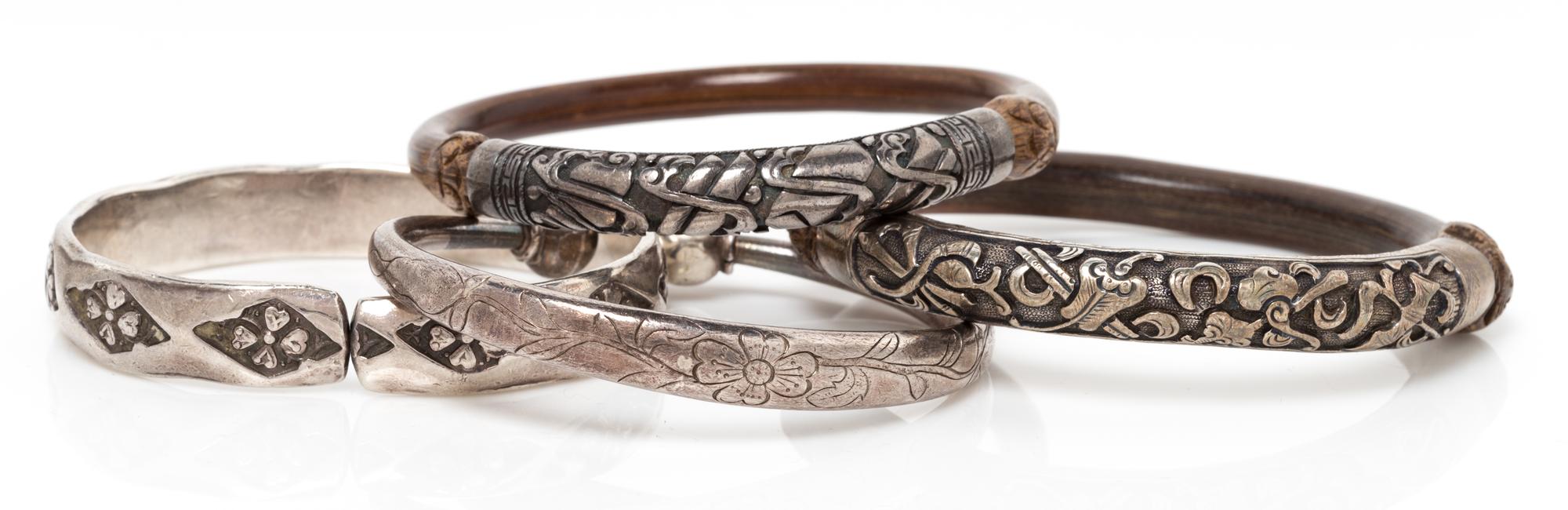 A Collection of Silver and Bamboo Bangle Bracelets, 119.90 dwts.
