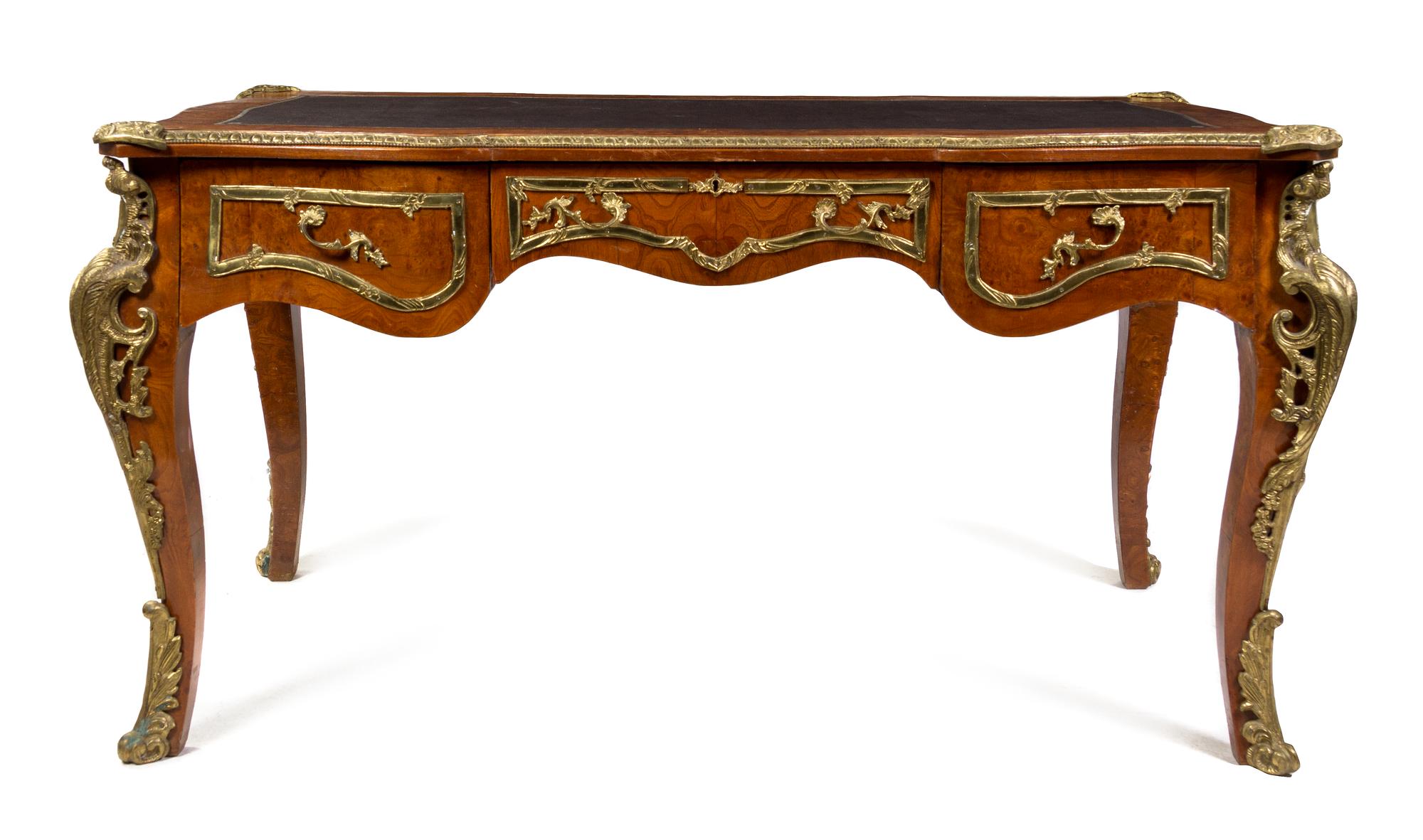 A Louis XV Style Gilt Metal Mounted Burlwood Bureau Plat, Height 31 3/4 x width 59 1/2 x depth 32 1/2 inches.