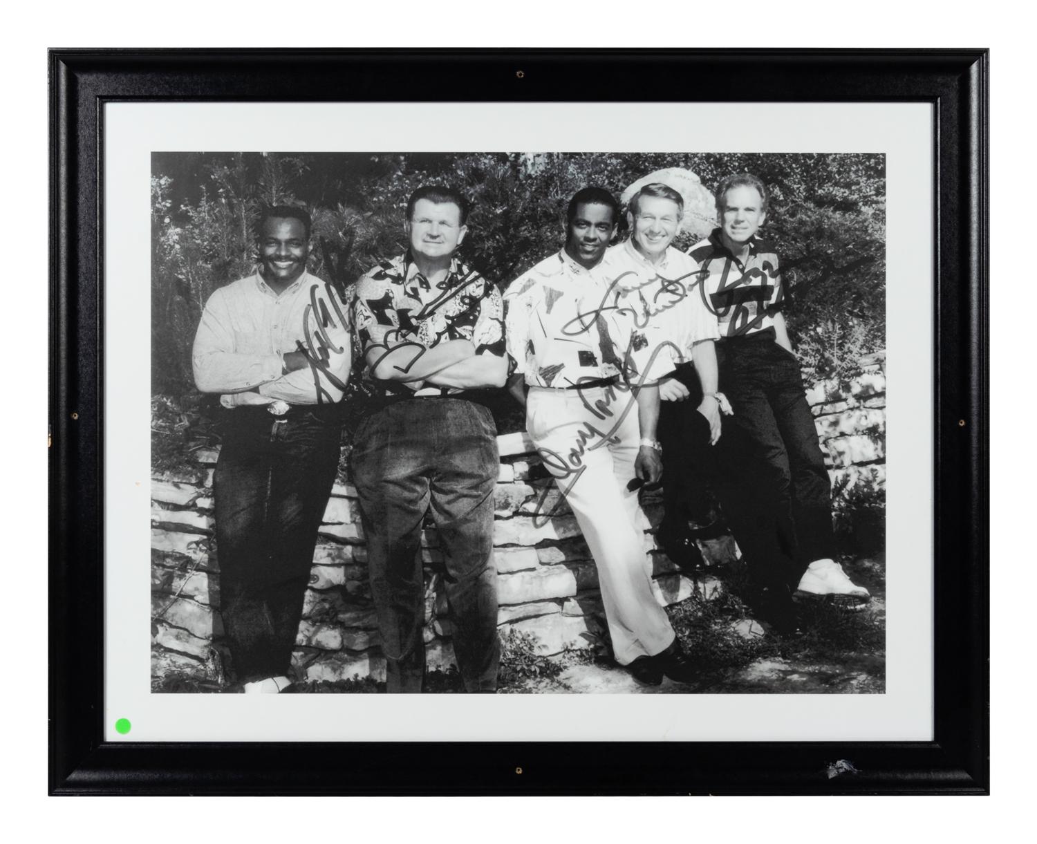 A Group of Ten Candid and Personal Photographs from Mike Ditka’s Restaurant