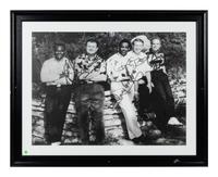 A Group of Ten Candid and Personal Photographs from Mike Ditka’s Restaurant