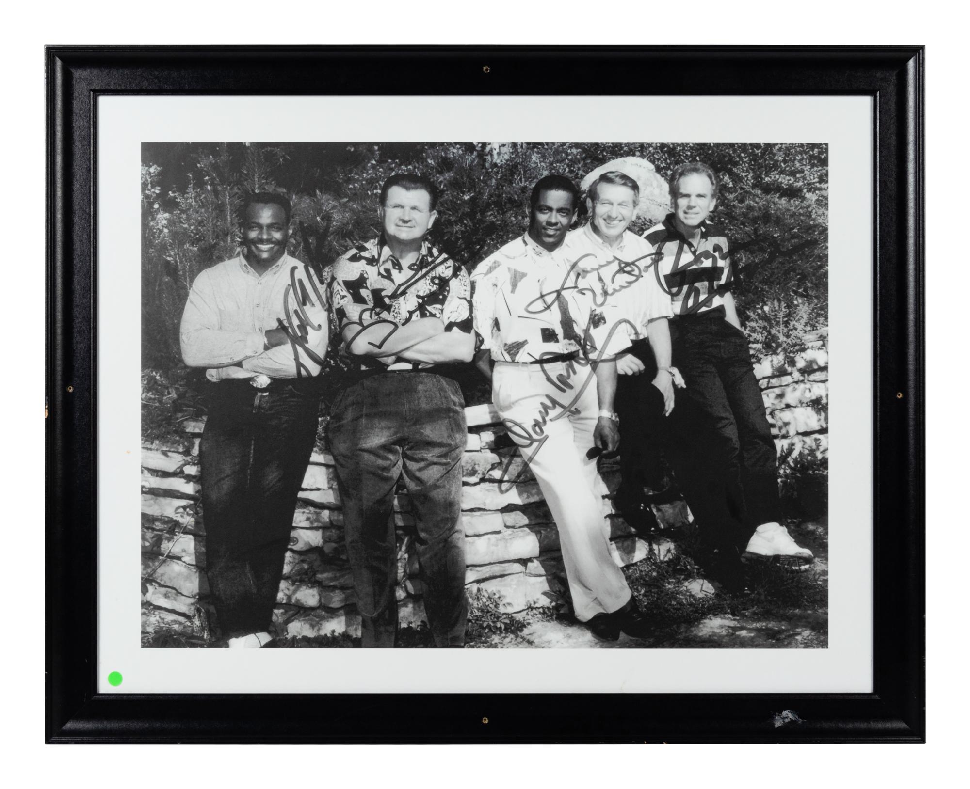 A Group of Ten Candid and Personal Photographs from Mike Ditka’s Restaurant