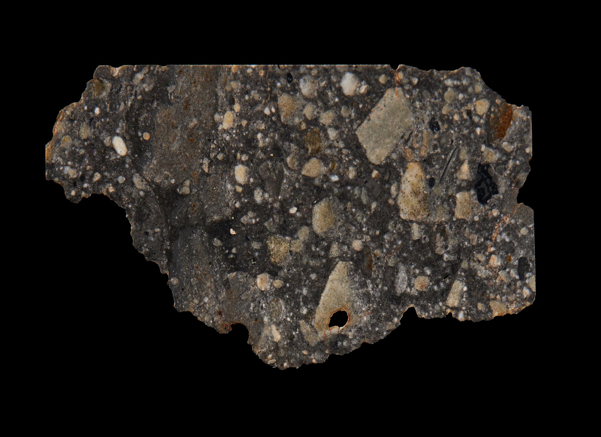 A Lunar Meteorite Slice (NWA 11303)