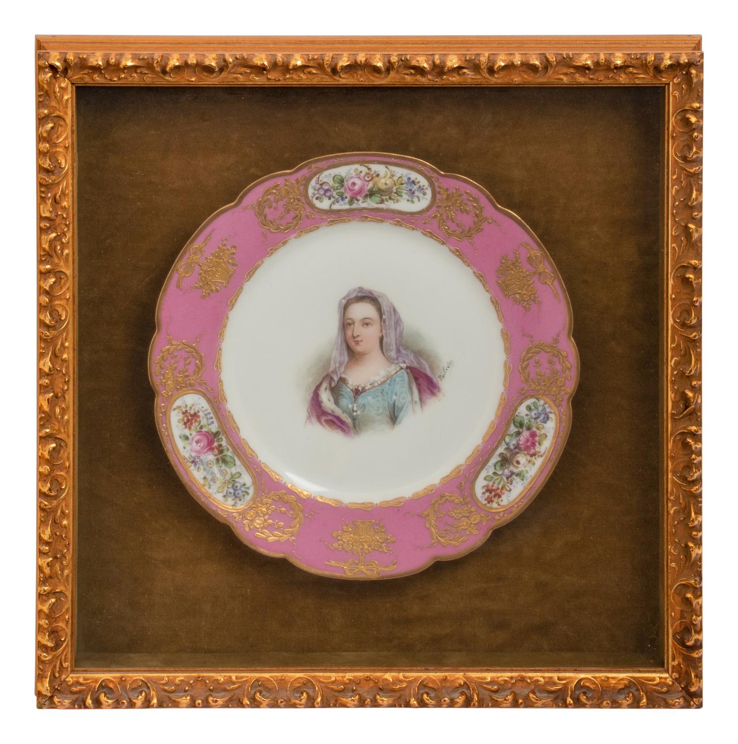 A Group of Seven Framed Sèvres Style Porcelain Plates
