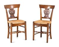 A Pair of Directoire Carved Walnut Rush-Seat Side Chairs