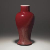 A Chinese Copper Red Glazed Porcelain Vase, 18th/19th Century — 清中期 紅釉觀音瓶