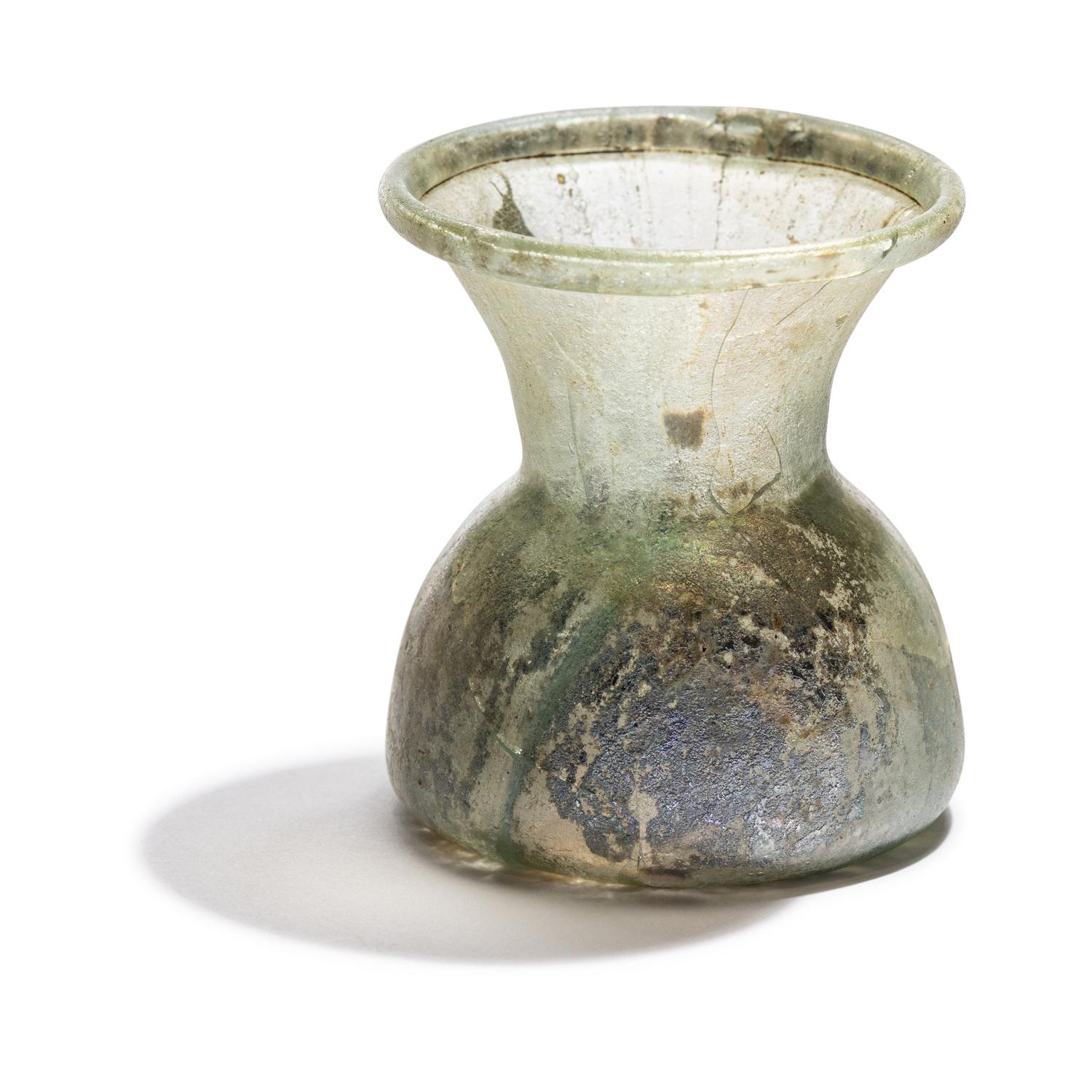 A Roman Pale Green Glass Vessel