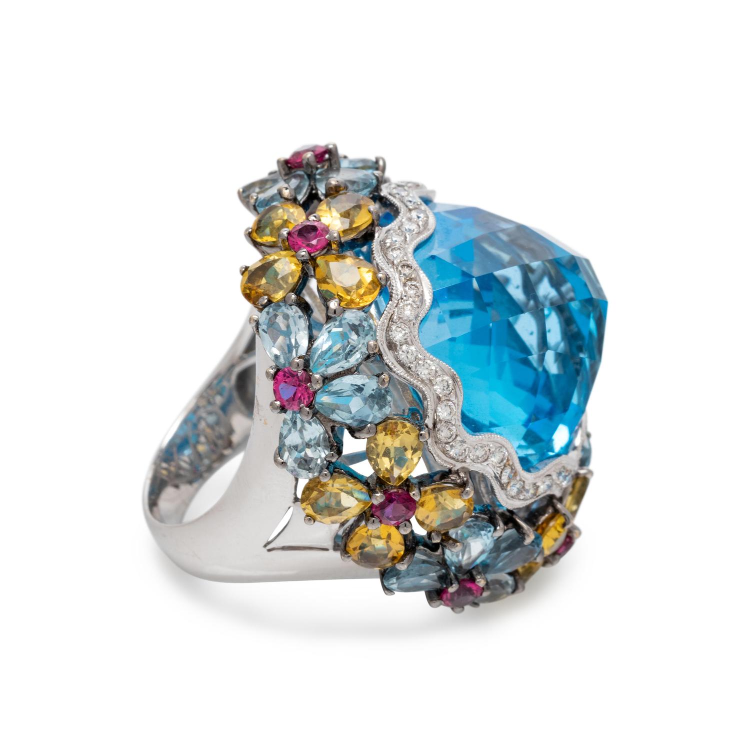 BLUE TOPAZ, DIAMOND AND SAPPHIRE RING