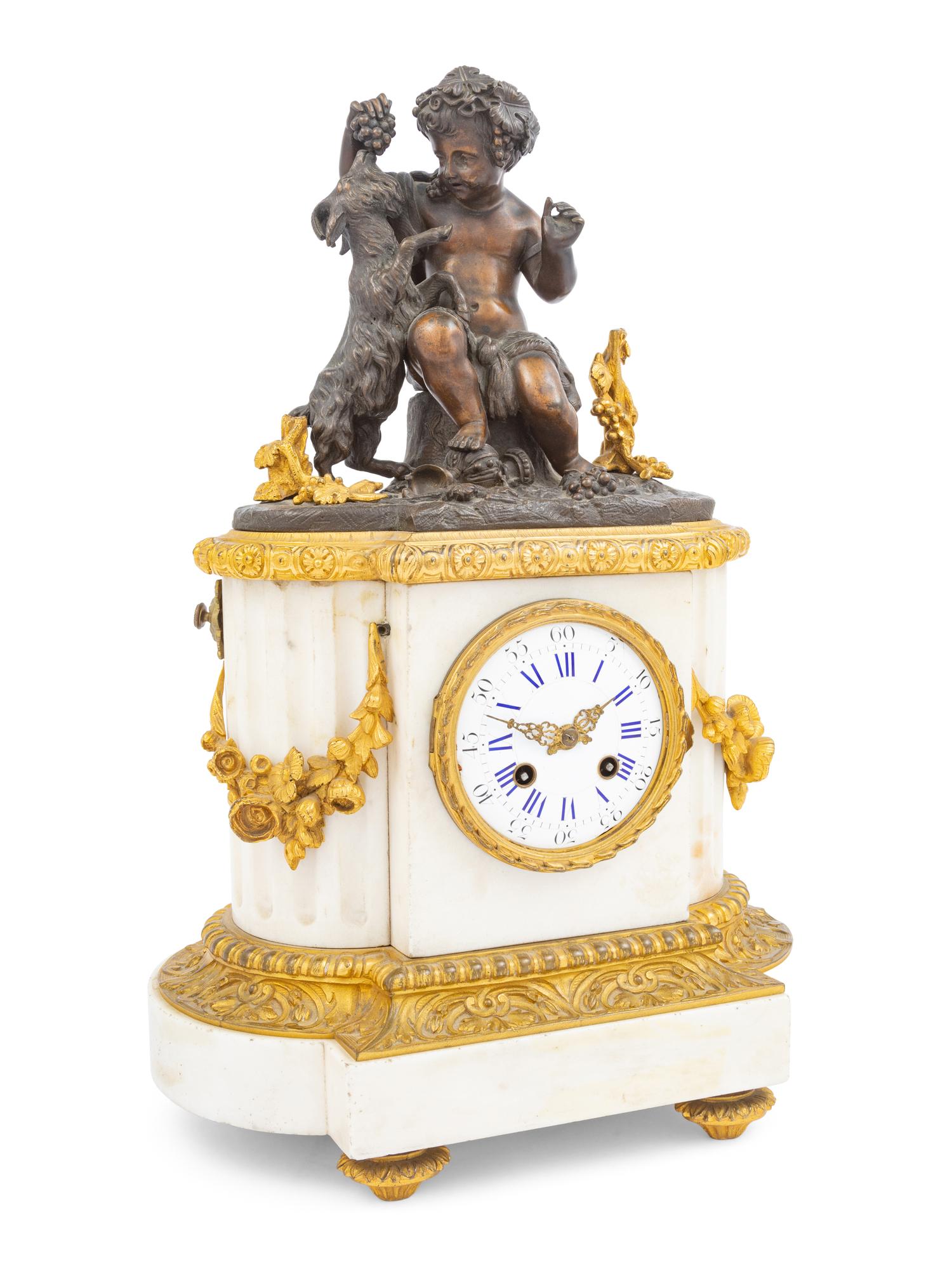 A French Bronze and Marble Clock