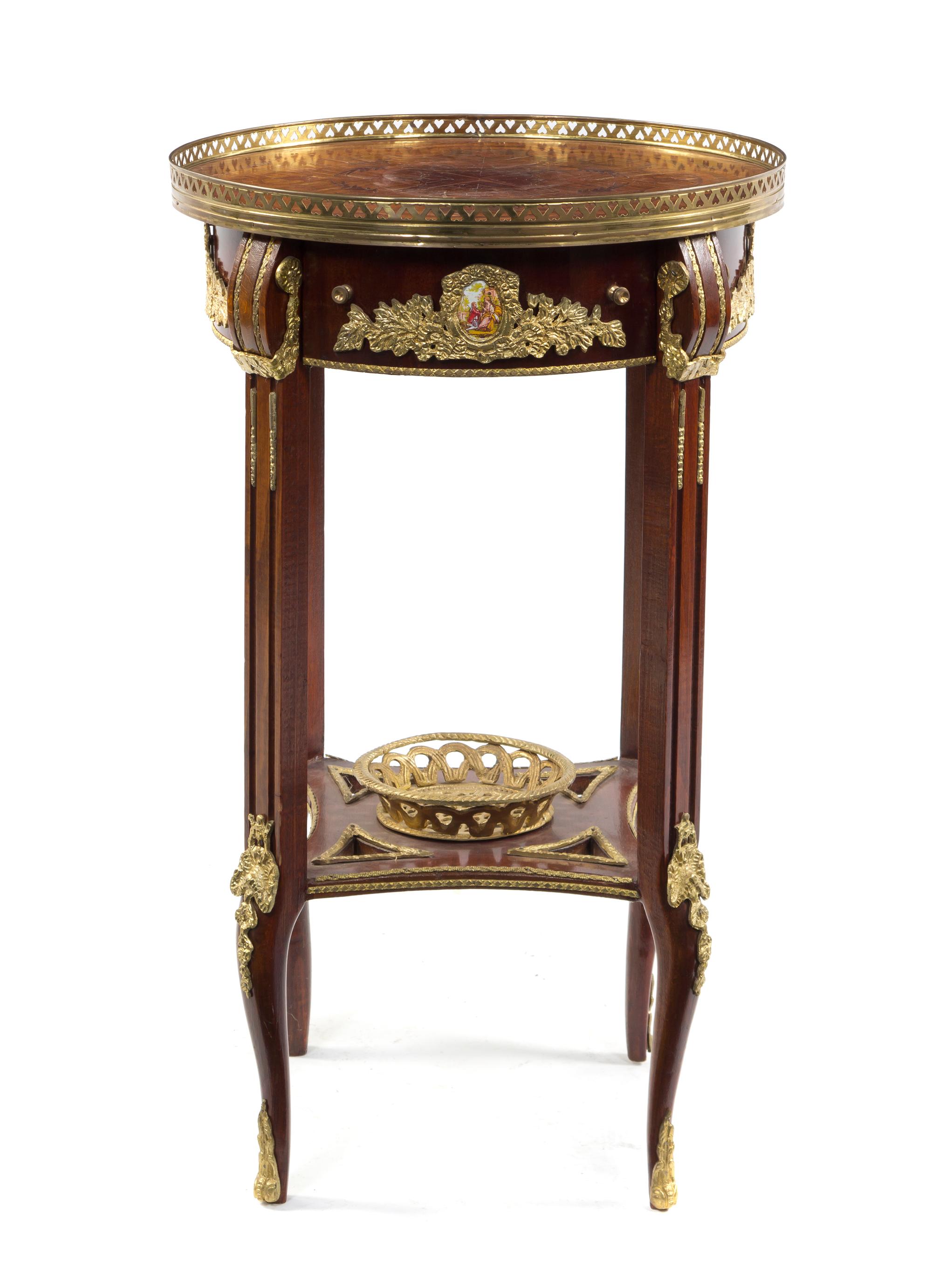 A Louis XV Style Gilt Bronze Mounted Gueridon, Height 30 x diameter 18 inches.