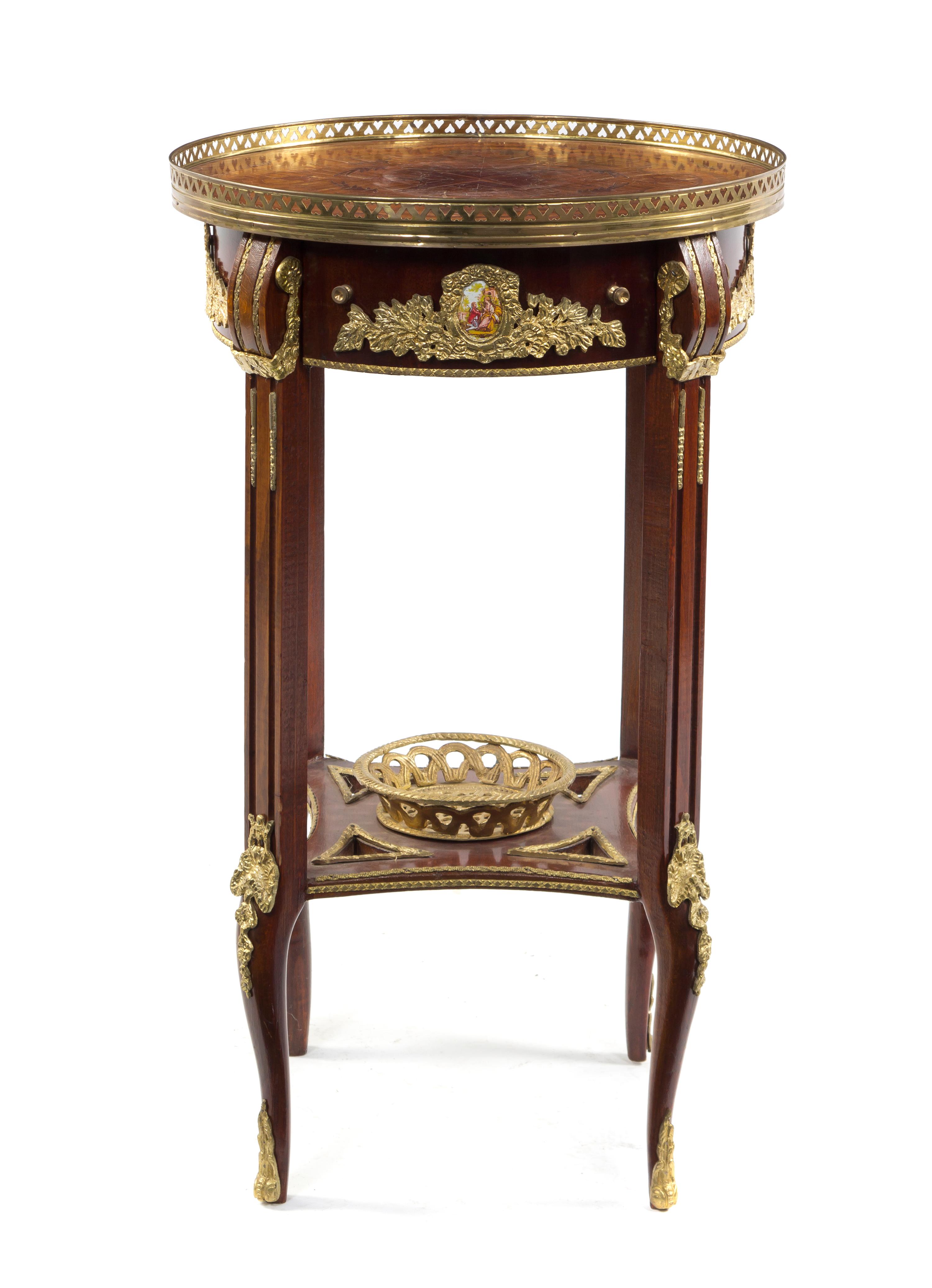 A Louis XV Style Gilt Bronze Mounted Gueridon, Height 30 x diameter 18 inches.