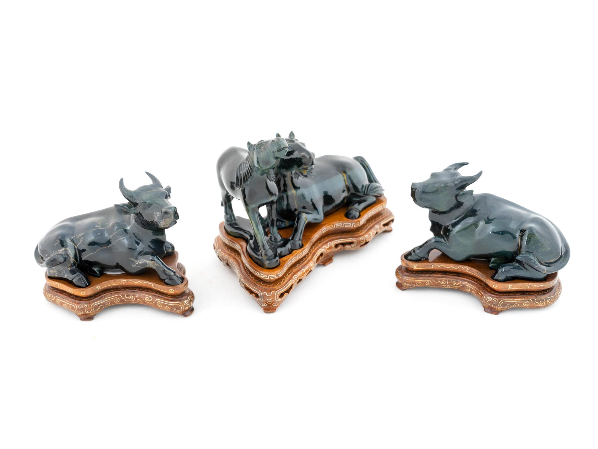 A Group of Three Onyx Figures — 20TH CENTURY