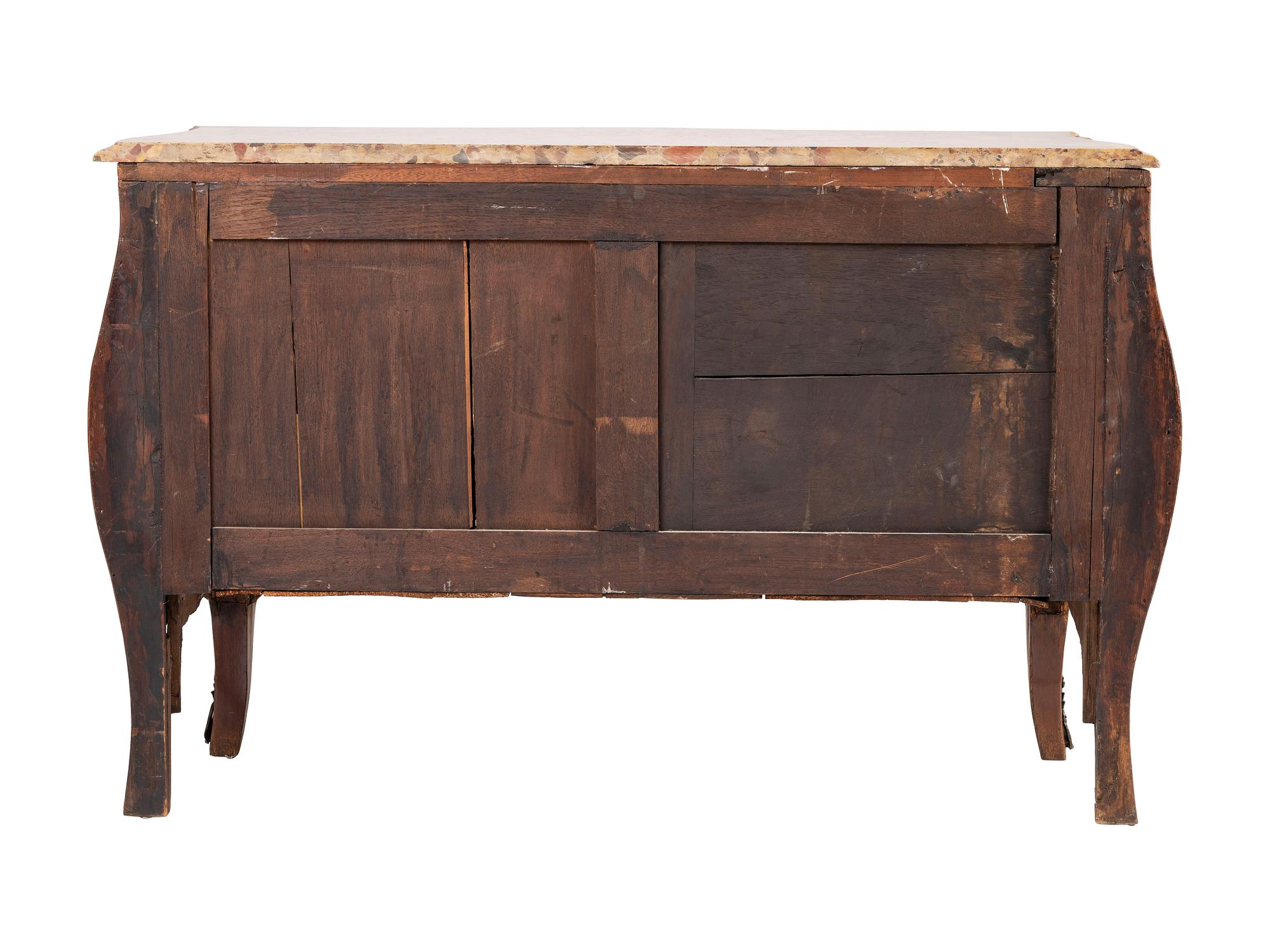 A Régence Style Bronze Mounted Marble Top Marquetry Commode