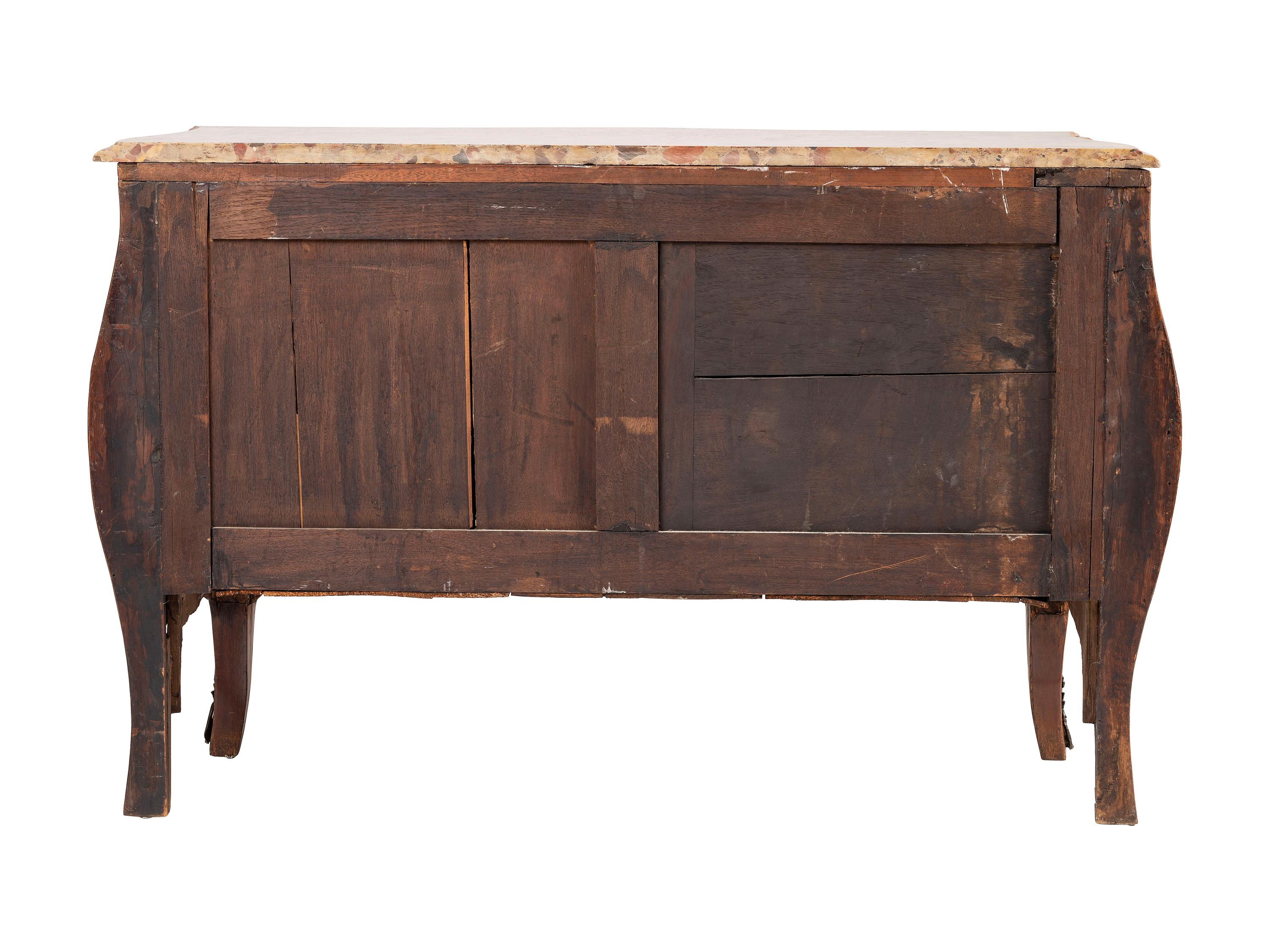 A Régence Style Bronze Mounted Marble Top Marquetry Commode