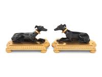 A Pair of French Gilt and Patinated Bronze Models of Greyhounds