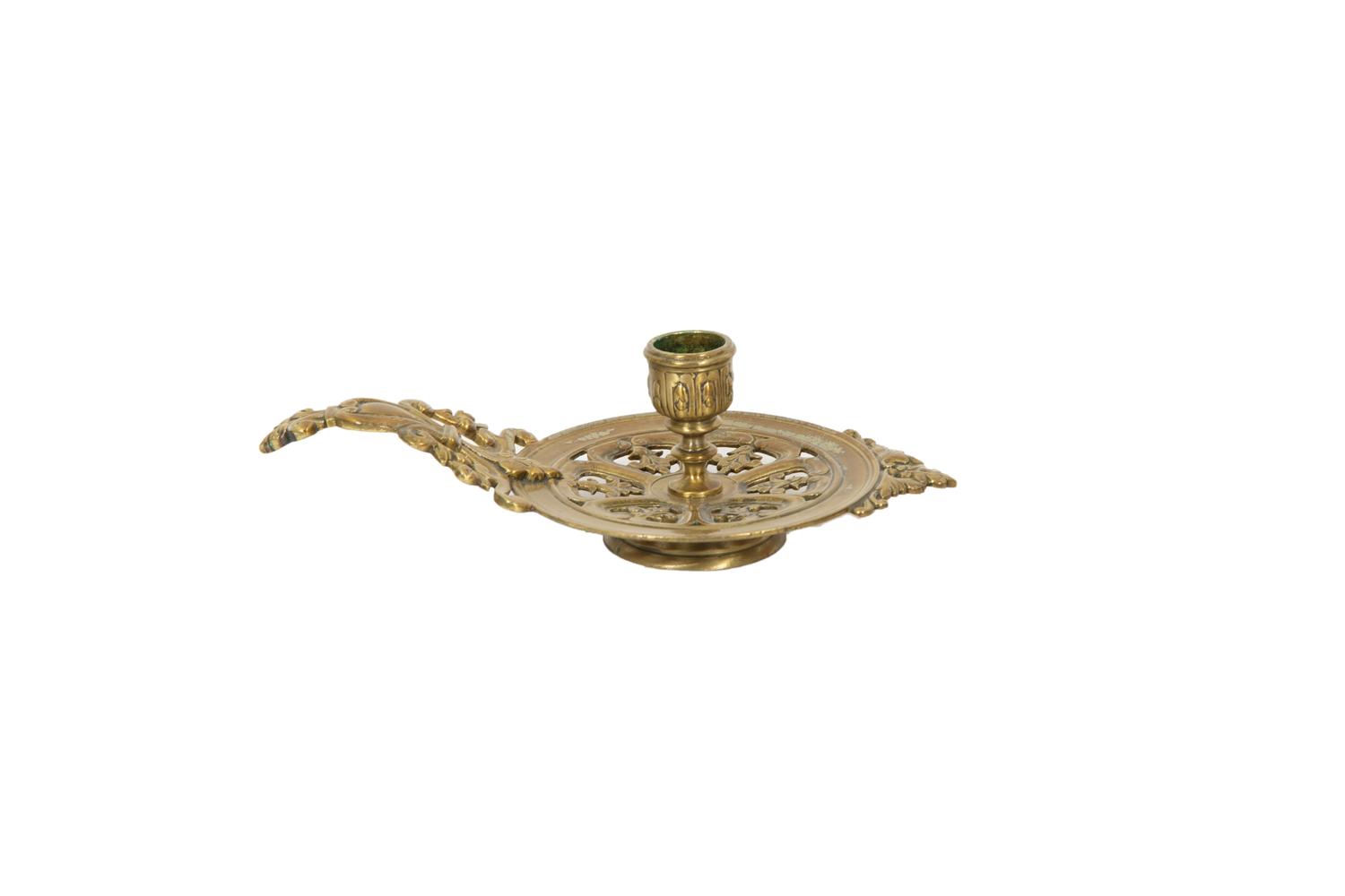 A Pair of Brass Candlesticks and a Pair of Chambersticks