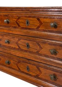 An Italian Baroque Walnut and Parquetry Commode