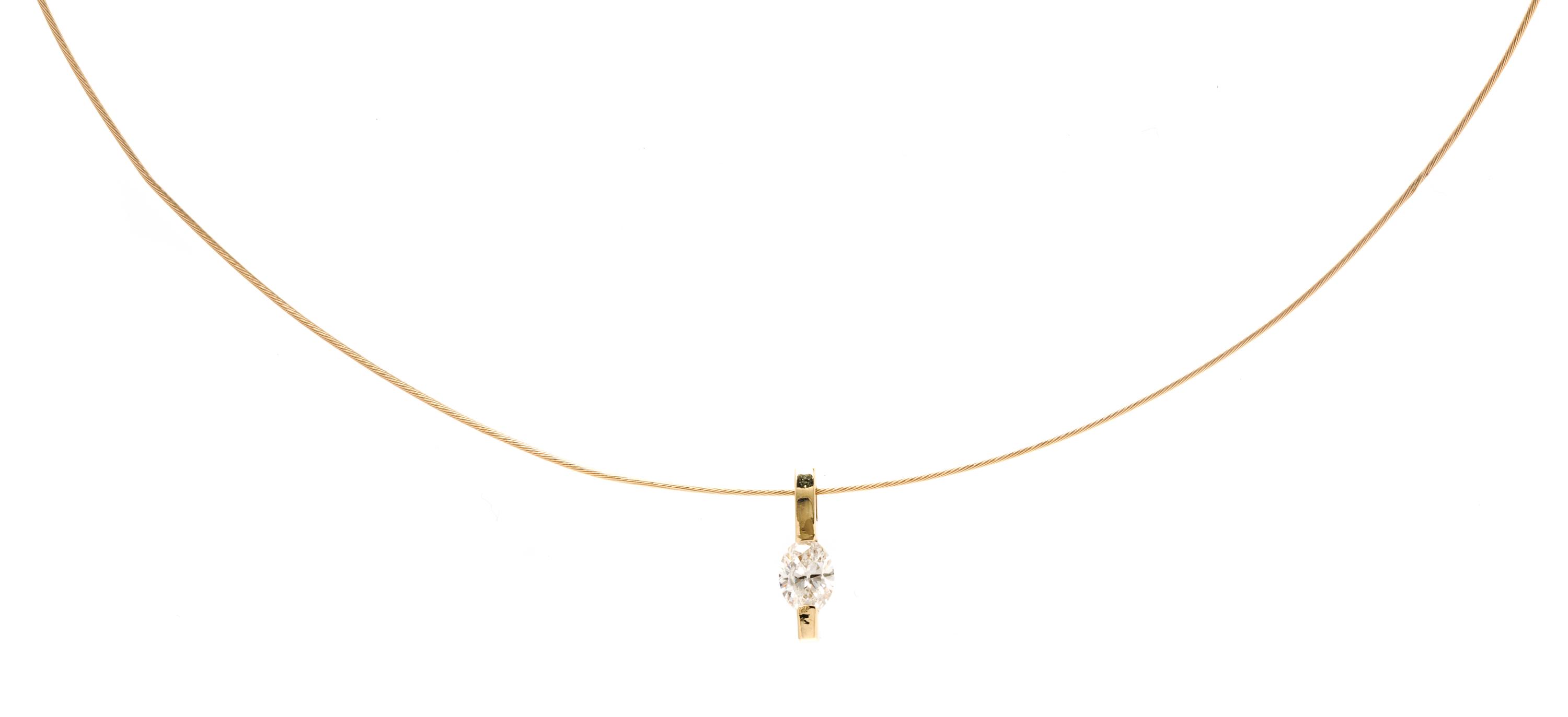 A 14 Karat Yellow Gold and Diamond Pendant, 2.20 dwts.