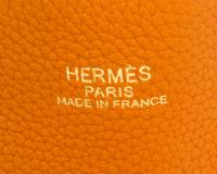 An Hermes Orange/Gold 45cm Taurillon Clemence Double Sens Tote, 17.5" x 15.5" x 5".